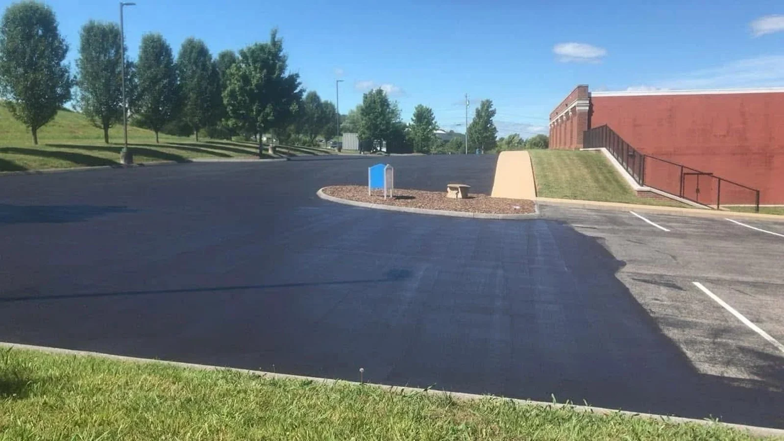 Freshly sealed asphalt at a property from The Lion Sealer gallery