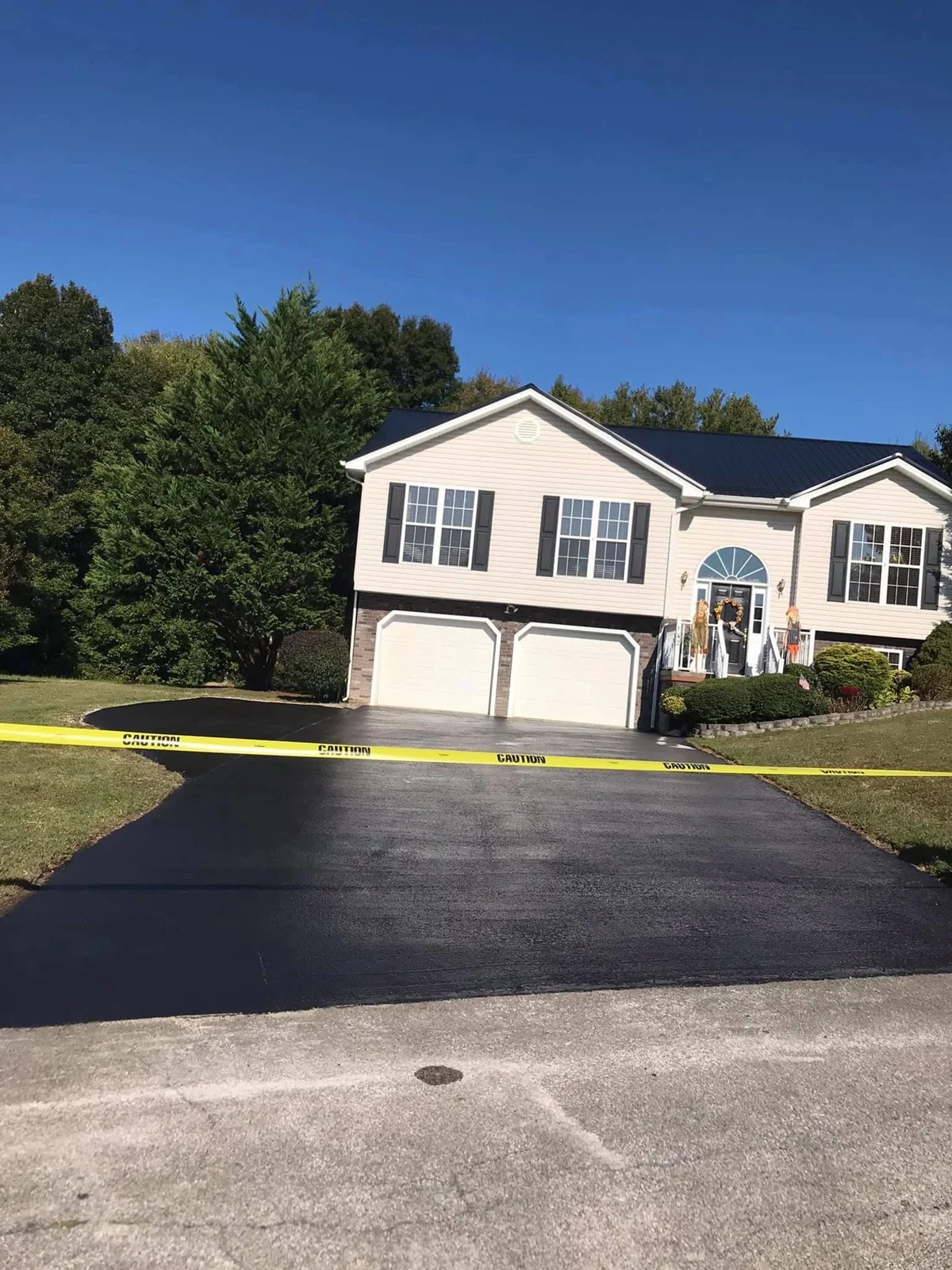 Residential asphalt driveway from The Lion Sealer gallery
